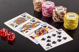 Live dealer in professional studio setting with multiple camera feeds